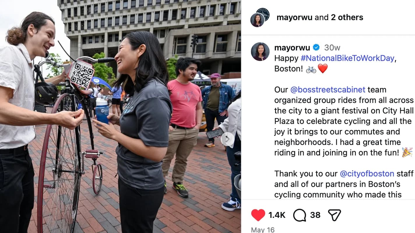 Mayor Michelle Wu's Instagram post for National Bike to Work Day, showing her being handed a QR-coded antique bicycle on City Hall Plaza
